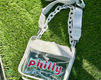 Sac à bandoulière transparent Philly - approuvé par les stades | Bandoulière en chaîne blanche + bandoulière réglable | Sac à main Game Day