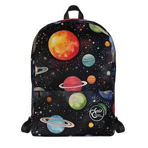 May include: A black backpack with a colourful space-themed print featuring planets, stars, and a galaxy background. The backpack has a red zipper pull and a logo that says "Lever's Co. Shop".