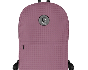 May include: A pink backpack with a black zipper and a grey circular logo with the letters "CS" in white.