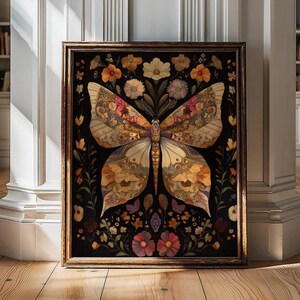 This poster,printed on museum grade paper,depicts an ornate and beautiful illustration of a butterfly on a black background.  The butterfly has ornate markings on wings, and is surrounded by flowers. The colors are muted shades of pink, red, beige.