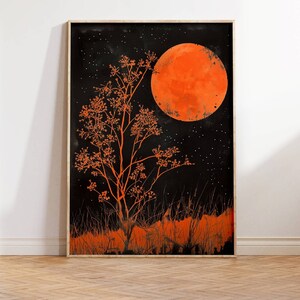 This gorgeous poster print features an illustration of an orange full moon above a matching orange tree, with orange grass  in the foreground. The sky is black and full of tiny stars.