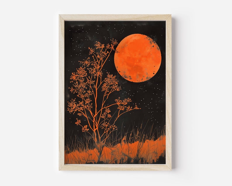 Peut inclure: Une estampe encadr&eacute;e repr&eacute;sentant un arbre orange stylis&eacute; avec une grande lune orange en arri&egrave;re-plan. La lune est entour&eacute;e de petites &eacute;toiles blanches sur un fond noir.