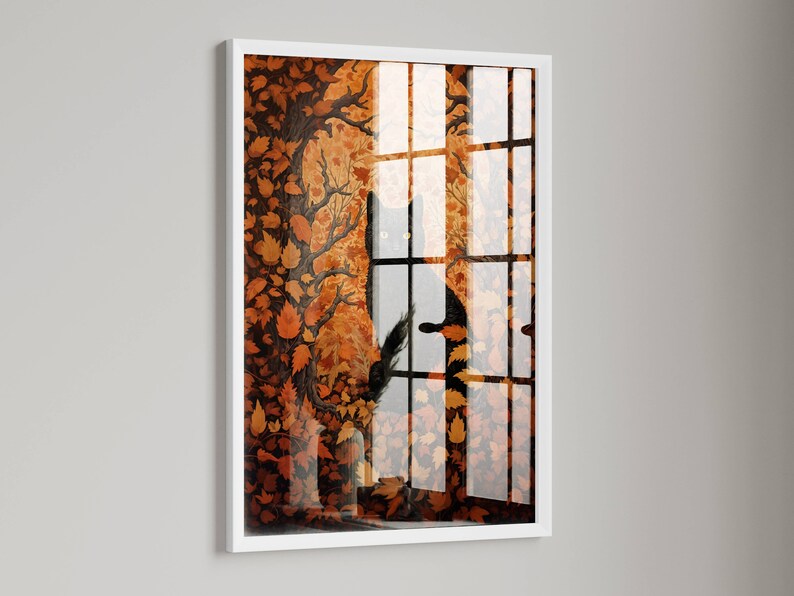 May include: A framed illustration of a black cat silhouetted against a window with a background of orange and brown leaves.