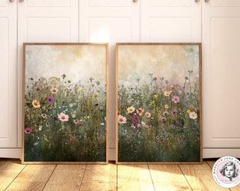 May include: Two framed prints of a field of wildflowers in shades of pink, purple, yellow, and white. The background is a soft, faded beige.