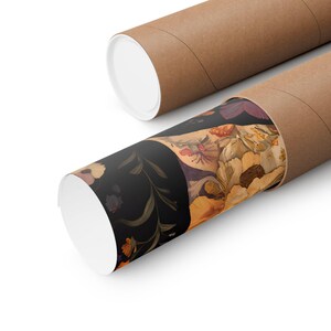 May include: A poster with a floral pattern in shades of orange, yellow, and purple is rolled up inside a brown cardboard tube.