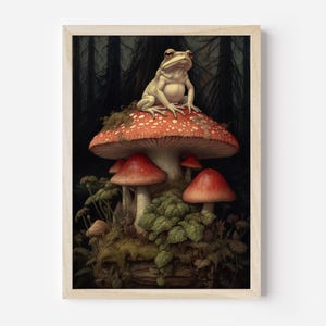 May include: A white frog sits on top of a red and white mushroom with white spots. The mushroom is surrounded by smaller red and white mushrooms and green foliage.