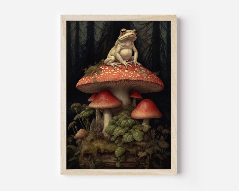 May include: A white frog sits on top of a red and white mushroom with white spots. The mushroom is surrounded by smaller red and white mushrooms and green foliage.