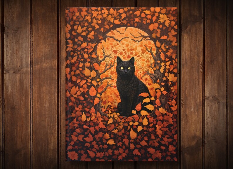 May include: A black cat sits in a circle of orange, yellow, and brown leaves. The cat has green eyes and is looking directly at the viewer. The background is a dark brown wood.