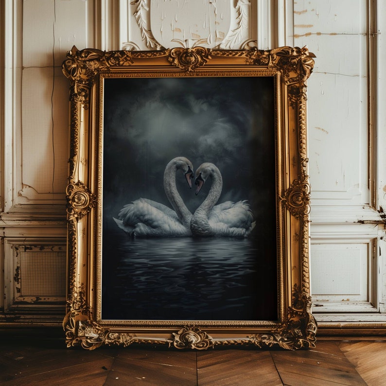 This gorgeous oil painting style print features a dark and moody illustration of two delicate swans facing each other floating in a lake. There are dark clouds overhead.