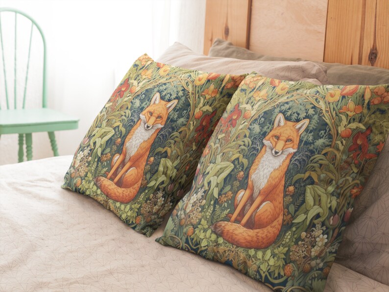 May include: Two decorative throw pillows with a green, brown, and orange fox design. The pillows are on a beige bed with a wooden headboard.