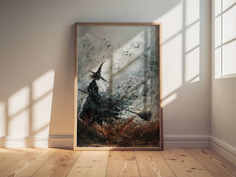 May include: A framed watercolor painting of a witch flying on a broomstick. The witch is wearing a black dress and a pointed hat. The background is a stormy sky with swirling clouds and rain.