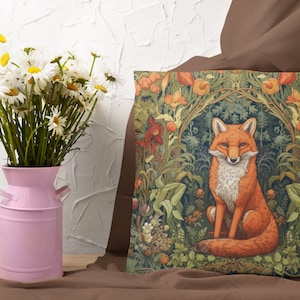 May include: A decorative throw pillow with a fox sitting in a lush green forest scene. The fox is orange and white with a bushy tail. The background is filled with green leaves, flowers, and vines.