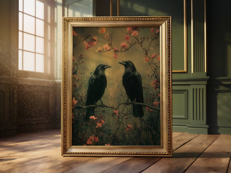 May include: A framed painting of two black crows perched on branches in a forest setting. The crows are facing each other and the background is a soft, muted green with pink flowers.