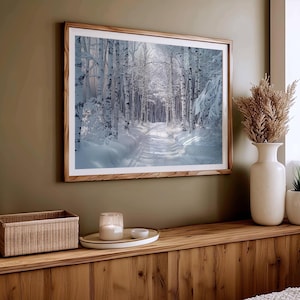 This gorgeous poster, printed on museum grade paper, depicts a detailed winter landscape.  A windy country road heavy with snow and lined with snow covered birch trees.  This poster is a perfect compliment to your winter and Christmas decor.