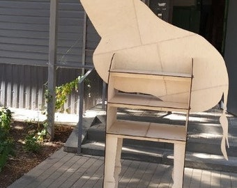 May include: A wooden giraffe cutout with a shelf unit attached to its back. The giraffe is standing on a gray brick patio.