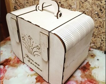 May include: A wooden box with a handle, decorated with stars and the text "Dreams come true".