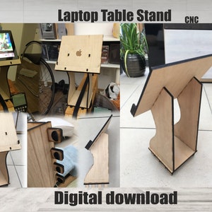 Puede incluir: Una descarga digital de un diseño de soporte de mesa para portátil cortado por CNC. El soporte está hecho de madera y tiene un acabado negro. El diseño está disponible en los formatos SVG, PDF, AI, CDR, DXF, AI y EPS.