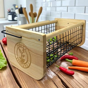 Gather your garden bounty in style with this durable Harvest Basket with Rotating Handle. Whether you’re collecting herbs, tomatoes, or fresh flowers, this basket keeps produce safe while reducing mess. Its timeless wooden design doubles as farmhouse décor when not in use. Personalization options let you create a meaningful, engraved gift for gardeners, moms, or friends who love the outdoors.