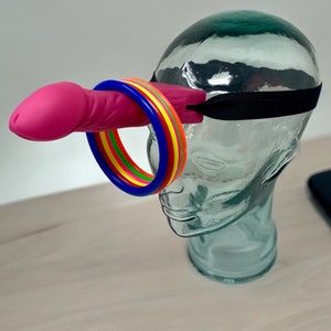 Welcome to our cheeky and unforgettable Bachelorette Party Game: "Penis Ring Toss Headband Edition"! Perfect for your wild bachelorette weekend or girls' night out, this game combines the fun of a classic baby shower game with a modern twist.