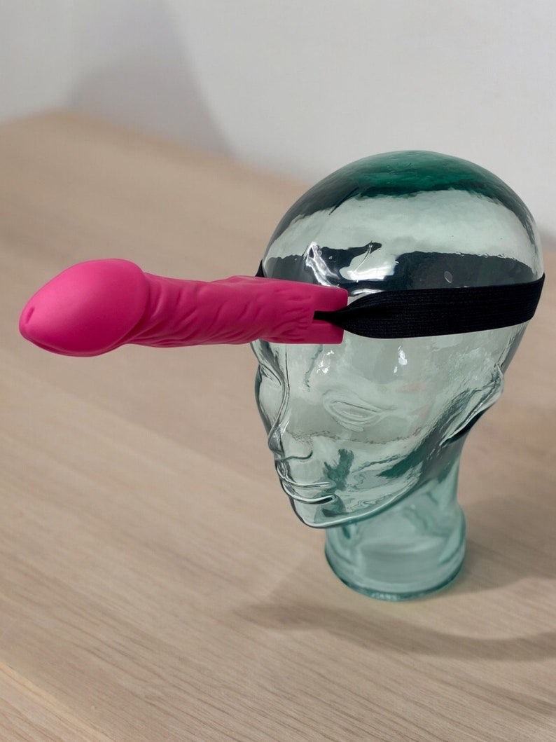 Strap on the pink cowgirl hat, grab your rings, and aim for the wiggling "henparty gift" on your friend's head. This is not your average never-have-i-ever or dirty drinking game—it's a one-of-a-kind ladies night game that guarantees