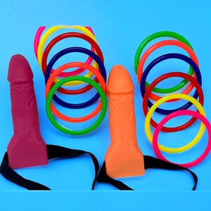 Spice up your hen party, bridal shower, or girls’ night out with this hilarious Bachelorette Ring Toss Game! Includes 12 colorful rings and two Velcro targets that stick for easy play. A reusable party favorite, this novelty game doubles as a drinking challenge or silly competition, making it perfect for bridesmaids, friends, and the star of the night—the bride herself!