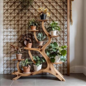 May include: A wooden plant stand with multiple shelves, displaying various potted plants. The stand has an organic, tree-branch-like design. The plants feature diverse green and brown foliage, in terracotta and white pots. The stand is a stylish home decor item.