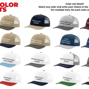 May include: A variety of trucker hats in different color combinations are displayed. The hats have a mesh back and a solid front panel. Text on the hats indicates the color combinations available, such as "Blue Teal/Bandanavy" and "White/Columbia Blue/Yellow".