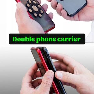 May include: Two black cell phone cases with a circular magnetic phone holder attached to the back. The phone cases are held in the hands of a person. The text "Double phone carrier" is visible below the image.