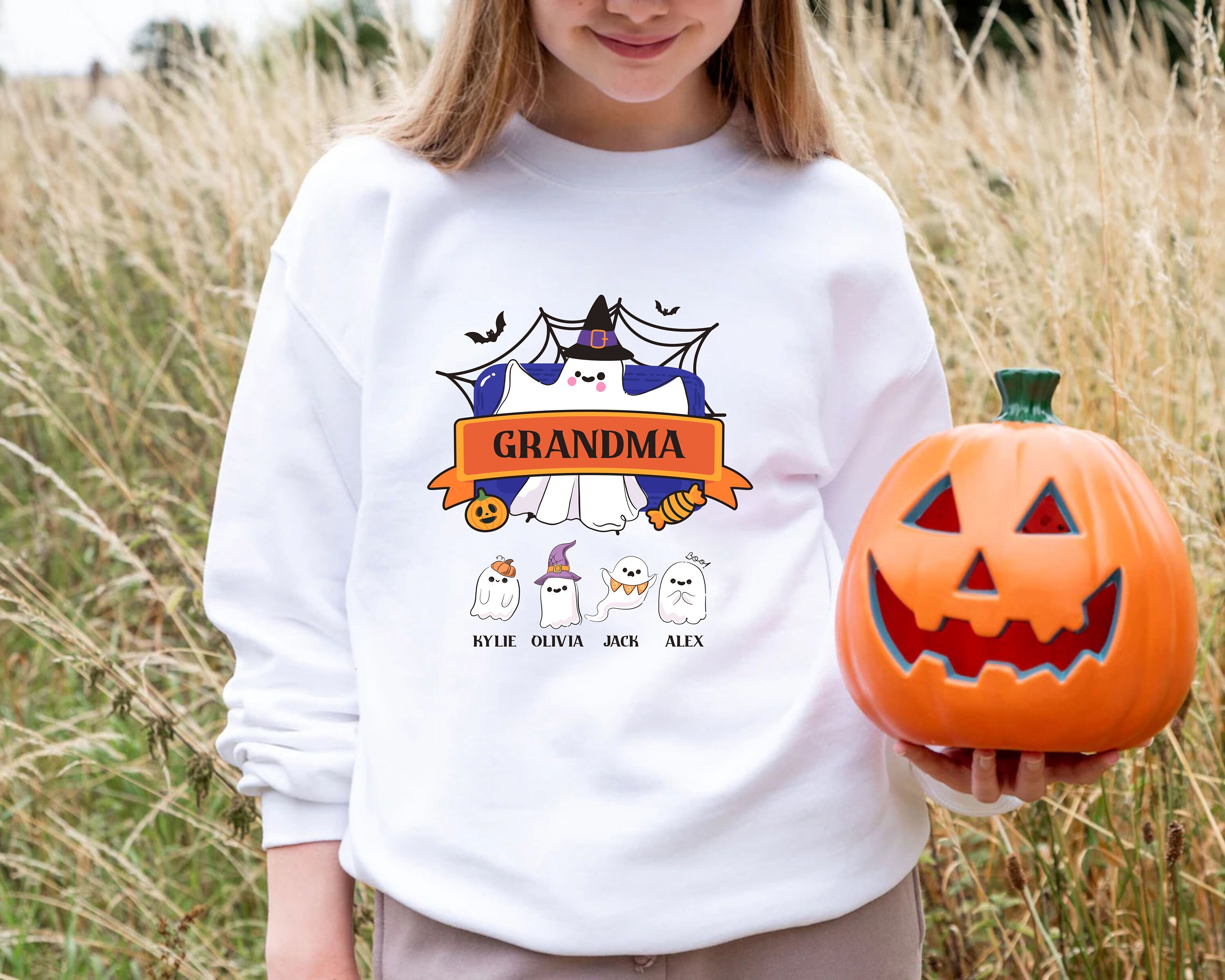 Discover Personalized Grandma Halloween Sweatshirt, Custom Grandkids Names Halloween Sweater, Trick Or Treat, Spooky Mimi Gift, Family Ghouls Shirt