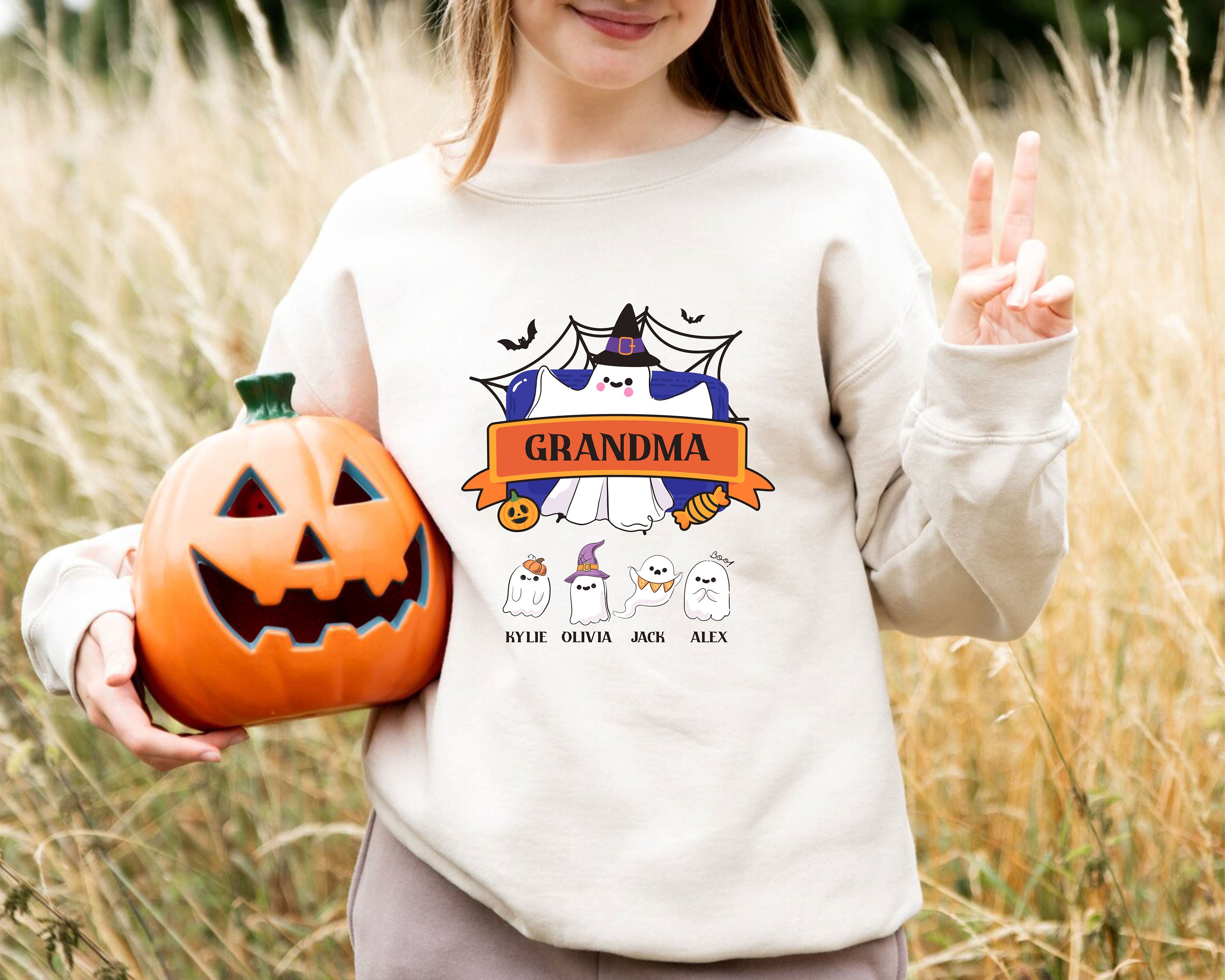 Discover Personalized Grandma Halloween Sweatshirt, Custom Grandkids Names Halloween Sweater, Trick Or Treat, Spooky Mimi Gift, Family Ghouls Shirt