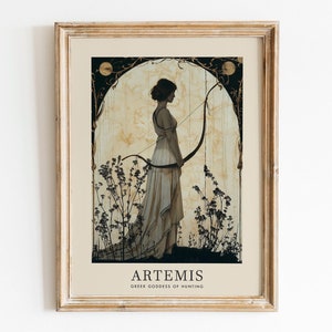 May include: Framed art print featuring a classical illustration of Artemis, the Greek goddess of hunting. The artwork depicts a woman in a flowing gown holding a bow, set against a backdrop of stylized plants and a soft, textured background. The text "ARTEMIS GREEK GODDESS OF HUNTING" is at the bottom.