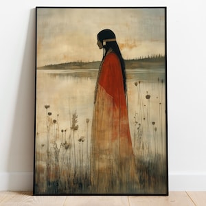 Könnte beinhalten: Gerahmter Kunstdruck mit einer Figur im Profil, die einen roten Schal und ein langes Kleid trägt und in der Nähe eines Sees steht. Das Kunstwerk hat eine gedämpfte Farbpalette mit Erdtönen und einem ruhigen Landschaftshintergrund.