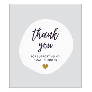 May include: A light gray card with the words "thank you" in dark purple script inside a white oval. Below the text is the phrase "FOR SUPPORTING MY SMALL BUSINESS" and a gold glitter heart.