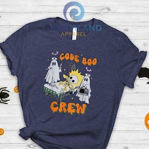 May include: A heather navy blue t-shirt with a graphic of three ghosts, one of which is a sun, with the text "Code Boo Crew".