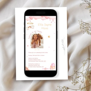 May include: A pink and white mobile phone screen with a memorial invitation for Ella Jayne Hicks. The invitation includes a photo of a young girl holding a teddy bear, a date, and the location of the service and reception.