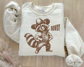 Western Rodeo Raccoon Sweatshirt, Vintage Cowboy Raccoon Graphic Tee, Cute Trash Panda Sweater, Funny Raccoon Meme Sweatshirt, Rodeo Shirt