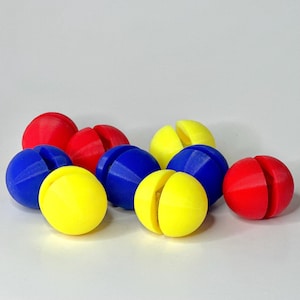 May include: A white ceramic mug with a black handle and the text "But First, Coffee" in a bold, black font. The mug is set against a neutral background, highlighting its simple design.