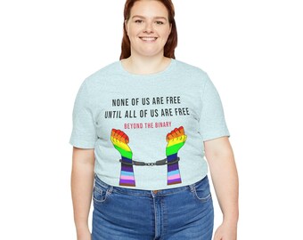 None of Us are Free -  Rainbow Fists shirt | LGBTQ+ solidarity tee