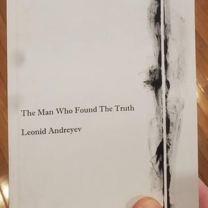May include: A white book with black text on the cover. The title is "The Man Who Found The Truth" by Leonid Andreyev.