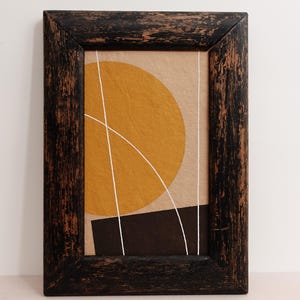 May include: A white ceramic mug with a black handle and the text "But First, Coffee" in a black, handwritten-style font. The mug is on a white surface.