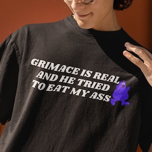 Grimace is real and he tried to eat my ass - Unisex