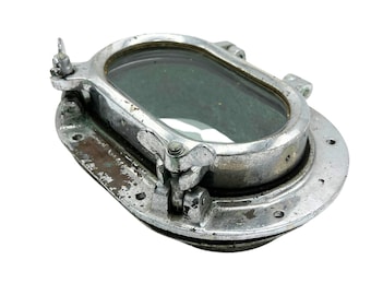 salvaged chrome covered brass oval porthole