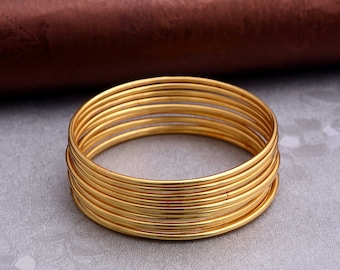 Gold Dipped Brass Bangle Set, 7 Thin Stackable Bracelets