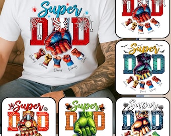 May include: White t-shirt featuring a "Super Dad" design with a superhero theme. The design includes a red and blue fist, spiderwebs, and the text "Super Dad". Smaller fists with names are below the main design.