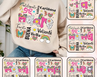 May include: A beige sweatshirt with a pink and black graphic design that says "Madre" with the words "inteligente, cariñosa, sabia, fuerte, buena, valiente, bella" surrounding it. The graphic also includes a butterfly, a rainbow, and a daisy.