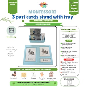 May include: A light blue 3D printable Montessori 3-part cards stand with tray, featuring slots for cards. The display shows cards with images of a mallard duck and a rabbit, with the text 'Mallard' and 'Rabbit' printed on the accompanying labels.