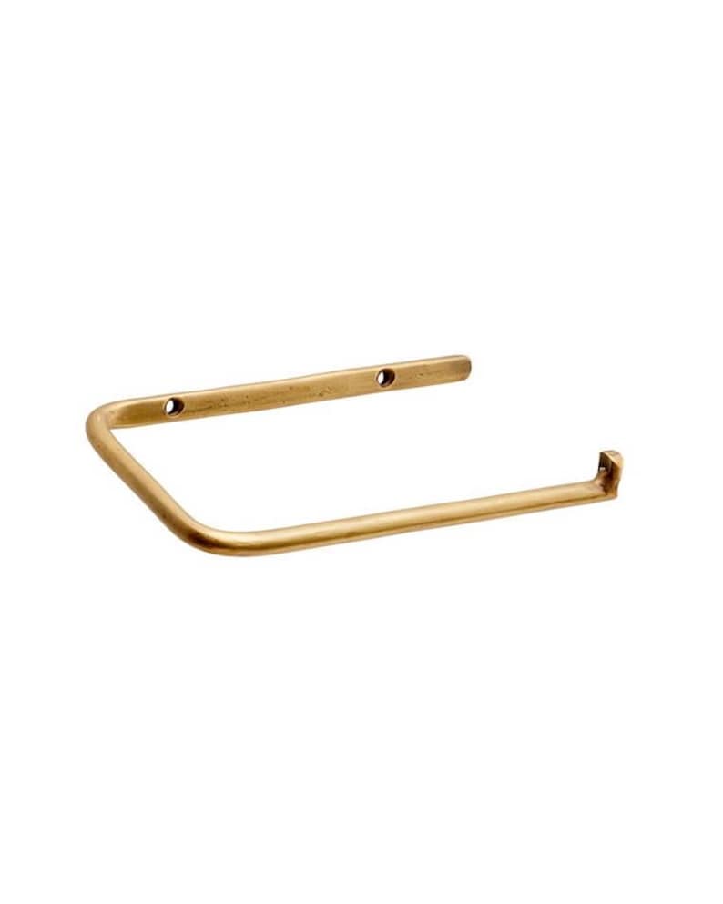 Pode incluir: Um suporte de papel higi&eacute;nico em metal dourado. O suporte tem uma placa de montagem retangular com dois orif&iacute;cios para parafusos e um bra&ccedil;o curvo para segurar o rolo. Design minimalista e moderno.