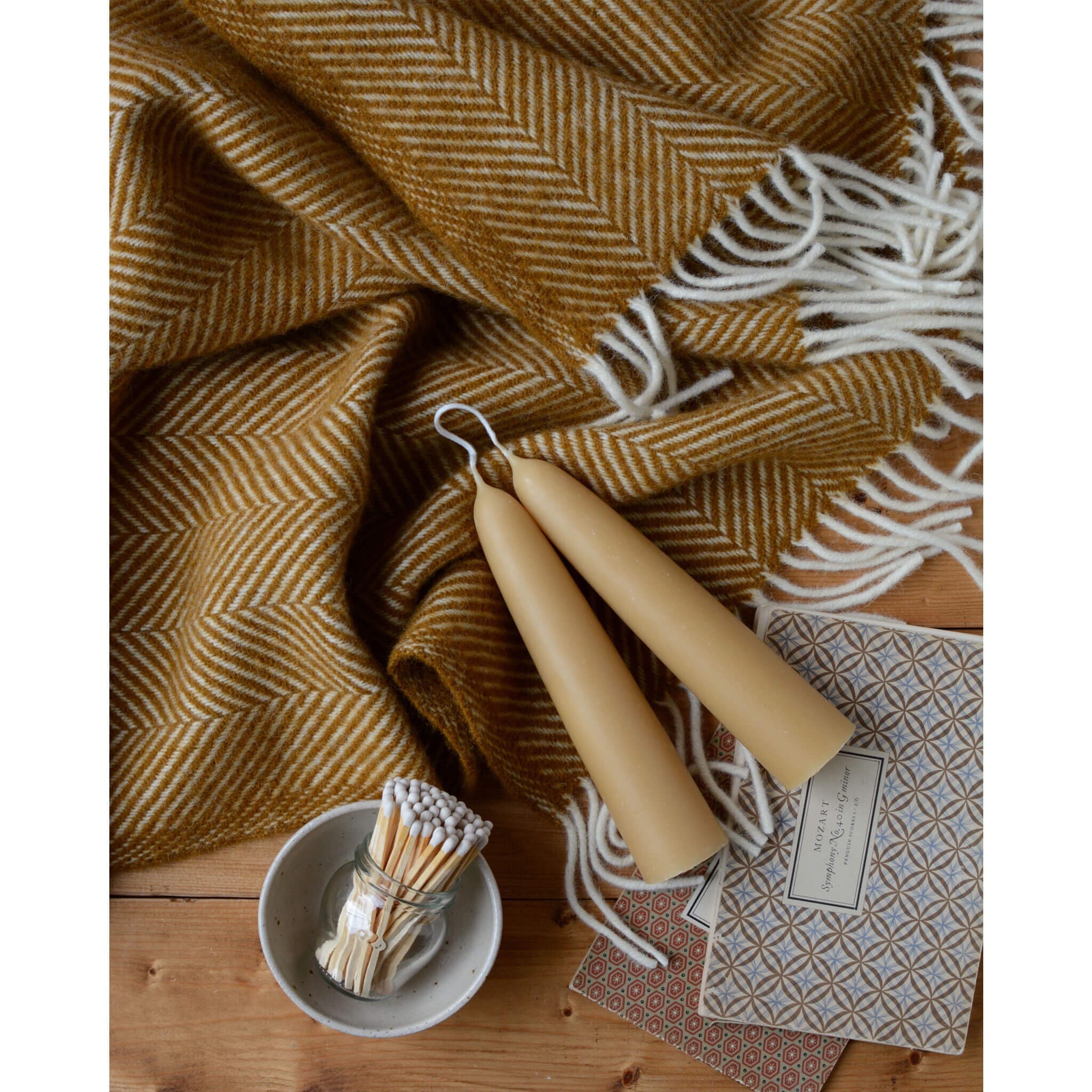 Ochre herringbone online throw