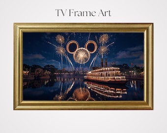 May include: A framed art print with a gold frame. The image shows a nighttime scene with fireworks in the shape of Mickey Mouse ears over a river with a steamboat. The text "TV Frame Art" is at the top.