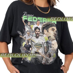 May include: Black t-shirt featuring a collage of images of Roger Federer, with the name "Roger Federer" in green and white text. The shirt includes tennis balls and the text "the nike". The brand name "REDLOLIPOP" is also visible.